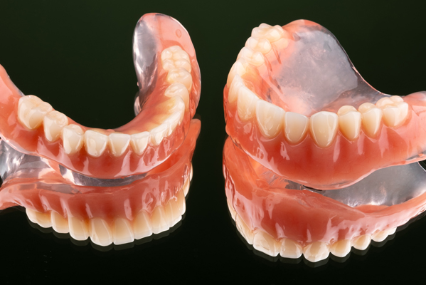 Proper Denture Care: Tips For A Comfortable, Long Lasting Fit